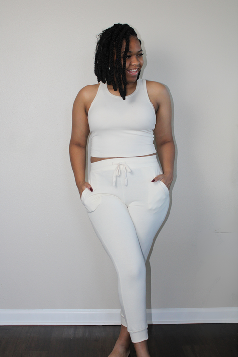 off white French Terry fabric joggers with pockets and drawstring closure and ribbed racerback tank set